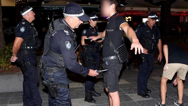 Police in Surfers Paradise 'wanding' revellers ahead of the passing of ‘Jack’s Law” in state parliament this week. Picture: Richard Gosling