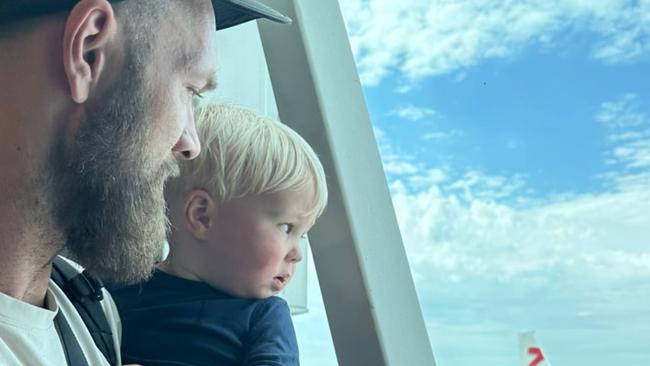 Demons skipper Max Gawn and his main man George hit the sky.