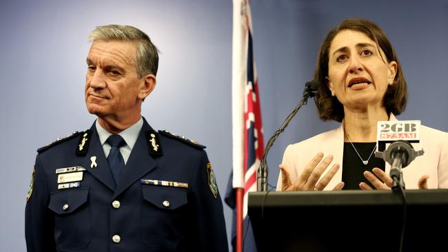 Premier Gladys Berejiklian and Police Commissioner Andrew Scipione yesterday. Picture: Brianne Makin