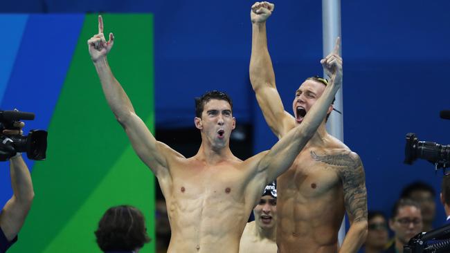 RIO DE JANEIRO, BRAZIL - AUGUST 07: Michael Phelps of United States celebrates during the Men's 4 x 100m Freestyle Relay during Day 2 of the Rio 2016 Olympic Games at Olympic Aquatics Stadium on August 7, 2016 in Rio de Janeiro, Brazil. (Photo by Ian MacNicol/Getty Images)