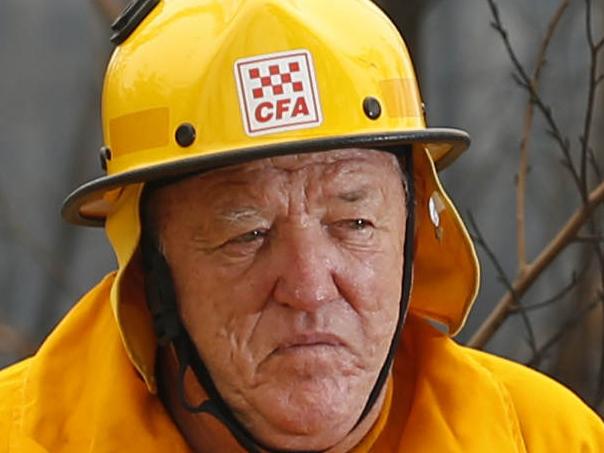 Victorian Fires Special. Mallacoota fire recovery feature. CFA firefighter Lindsay McHugh from South Morang, takes a break from checking smoldering trees near the town.   Picture: David Caird