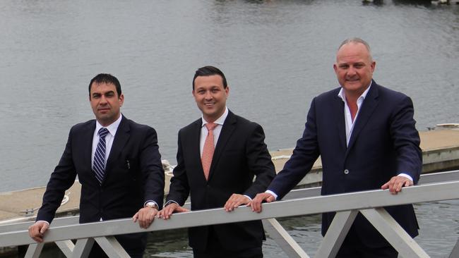 Ross Pelligra, Dion Giannarelli and Dean Giannarelli visit the site for their $480 million development at Mariner’s Cove.