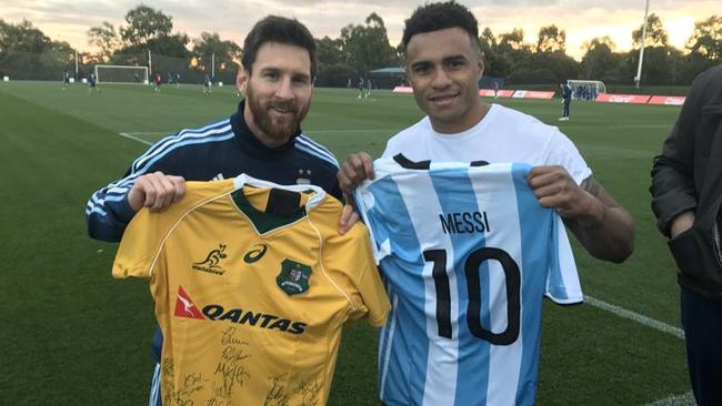 Will Genia with Argentine superstar Lionel Messi. Picture: ARU