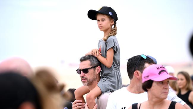 Young fans watch the race on Surfers Paradise in the Gold Coast. Picture: NCA NewsWIRE / John Gass