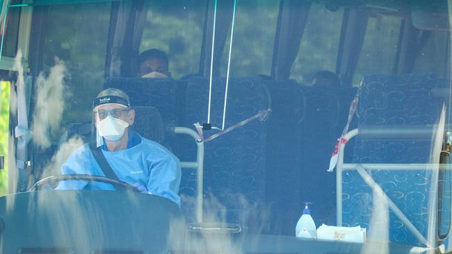 Passengers from a repatriation flight from New Delhi go to 14 days quarantine at Howard Springs. Picture: Glenn Campbell