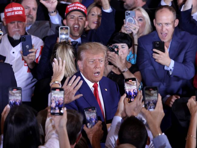 Donald Trump greets supporters at Mar-a-Lago. Picture: Getty Images via AFP