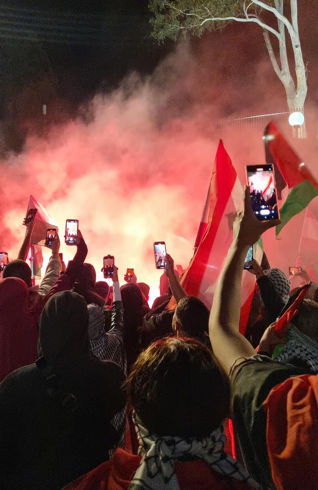 Flares were thrown into the crowd during the protests outside the Opera House. Picture: News.com.au / Jasmine Kazlauskas