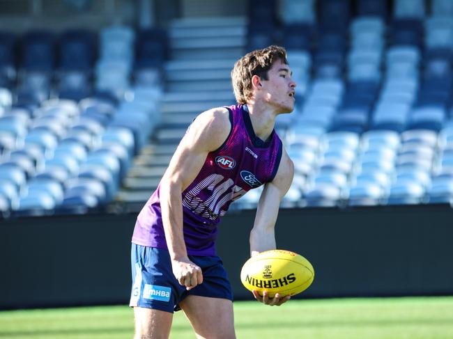 Zane Williams fires off a handball. Picture: Geelong Cats