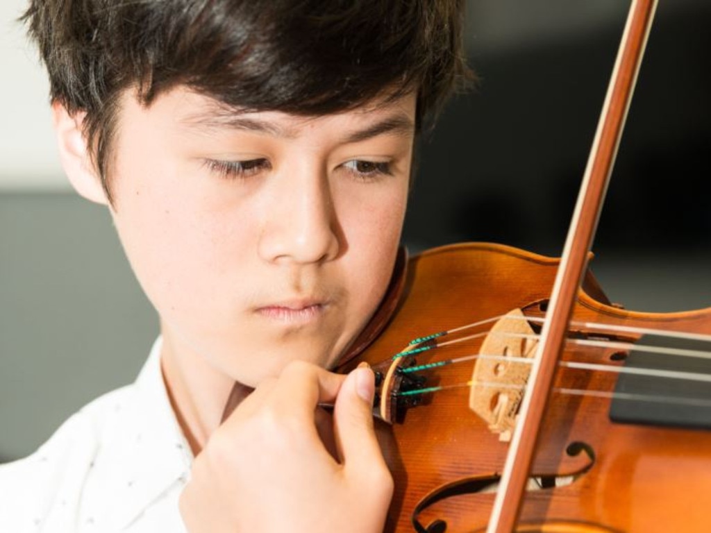 A student plays the violin at the Gold Coast Eisteddfod. Supplied by Pru Wilson Photography.