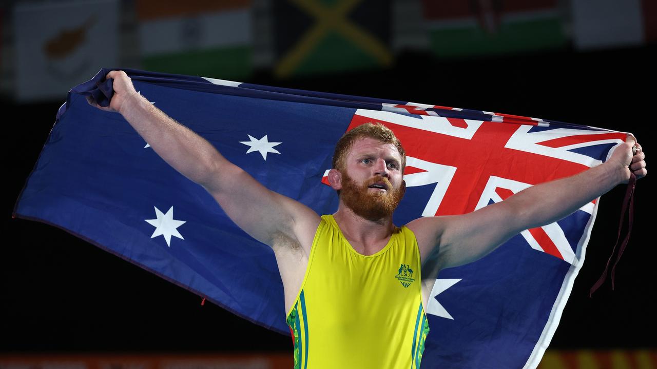 Jayden Lawrence celebrates after winning his first Commonwealth Games medal.