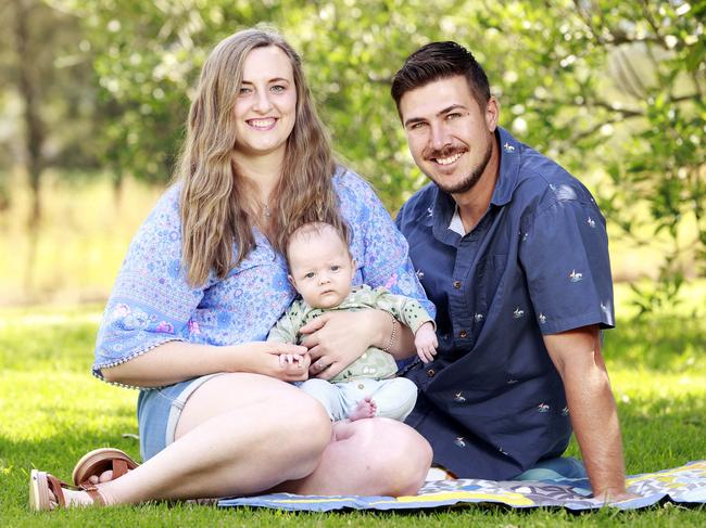 Hayley and Ben Oakley, and their 3-month-old baby son Arthur, who was born via surrogate after a long and difficult journey to parenthood. Picture: Tim Hunter