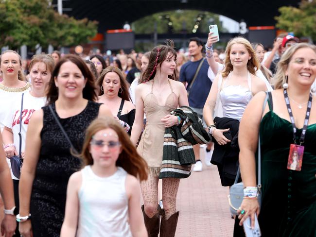 Fans arrive for Saturday’s Taylor Swift concert in Sydney, the second of her four shows in the Harbour City. Picture: Damian Shaw