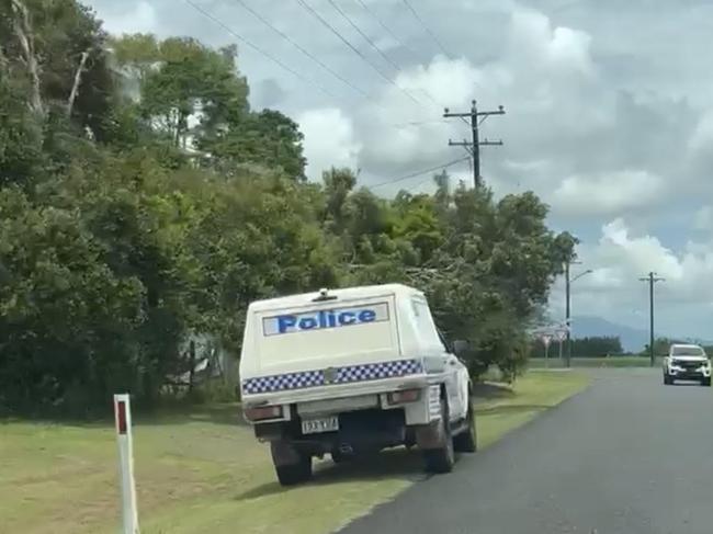 A police vehicle on Martyville Rd, Martyville - south of Innisfail where a man in his 20s was found dead on December 25. Picture: Supplied