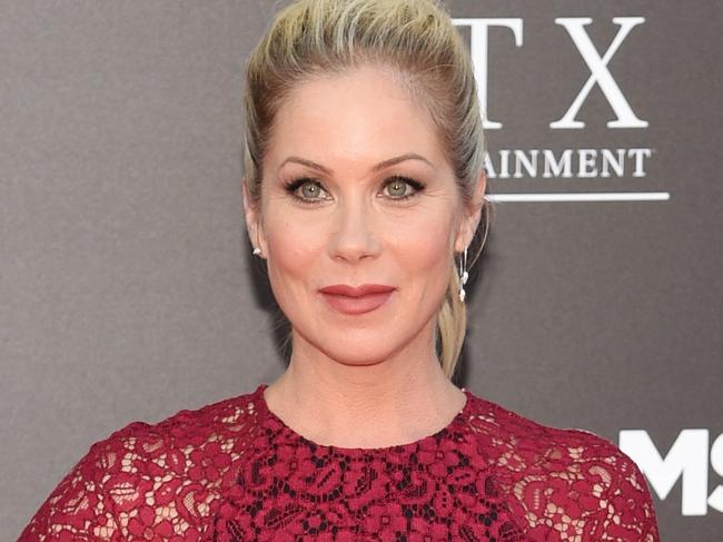 Christina Applegate, a cast member in "Bad Moms," poses at the premiere of the film at the Mann Village Theatre on Tuesday, July 26, 2016, in Los Angeles. (Photo by Chris Pizzello/Invision/AP)