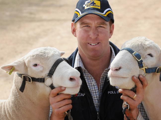 Mallee Field Days at Speed. Tim Ferguson with the champion ewe and ram from Mallee Park Poll Dorset stud.