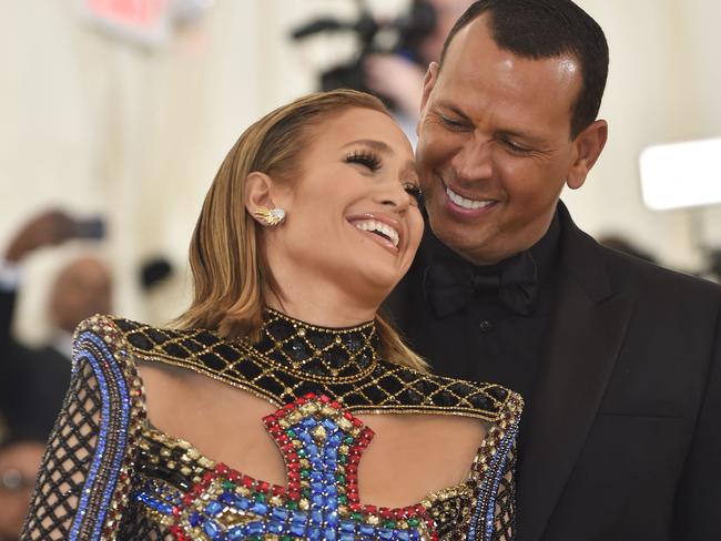 (FILES) In this file photo taken on May 7, 2018 Jennifer Lopez and Alex Rodriguez arrive for the 2018 Met Gala at the Metropolitan Museum of Art in New York. - Jennifer Lopez and fiance Alex Rodriguez have broken up, calling off their two-year engagement, US media reported on March 12, 2021. (Photo by Hector RETAMAL / AFP)