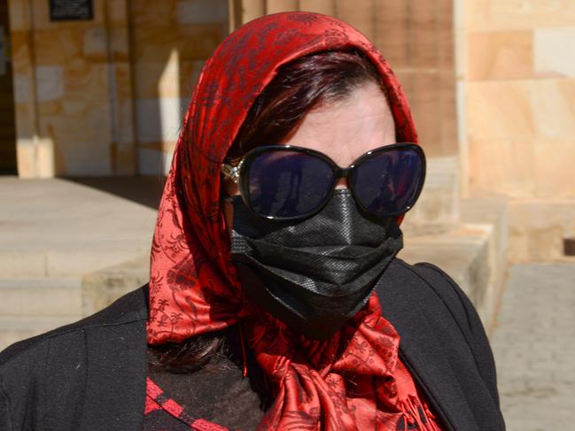 ADELAIDE, AUSTRALIA - NewsWire Photos SEPTEMBER 15, 2021: Patricia Tirimacco leaves the Adelaide Magistrates Court where she is accused of assaulting a disabled boy in her care. Picture: NCA NewsWire /Brenton Edwards