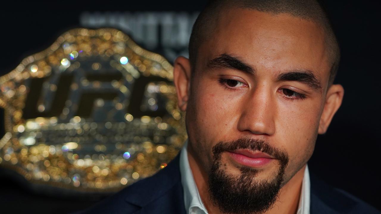 Robert Whittaker of Australia speaks to media during the UFC 243 Ultimate Media Day at Marvel Stadium in Melbourne, Friday, October 4, 2019. (AAP Image/Michael Dodge) NO ARCHIVING