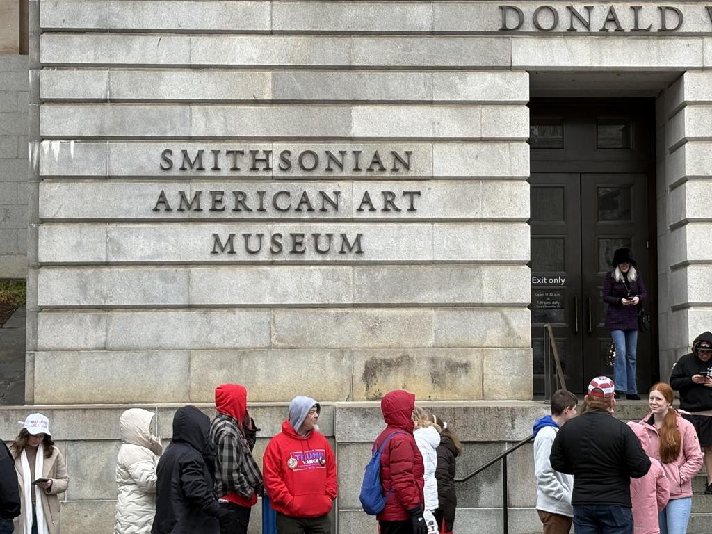 As people queued outside the Smithsonian, there were around six hours from getting into the arena. Picture: Benedict Brook.