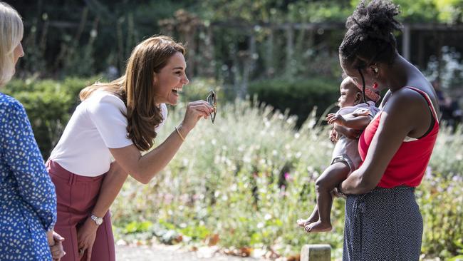 The Duchess of Cambridge met with parent group members and their babies to discuss the ways in which peer support can help boost wellbeing. Picture: Jack Hill/Getty