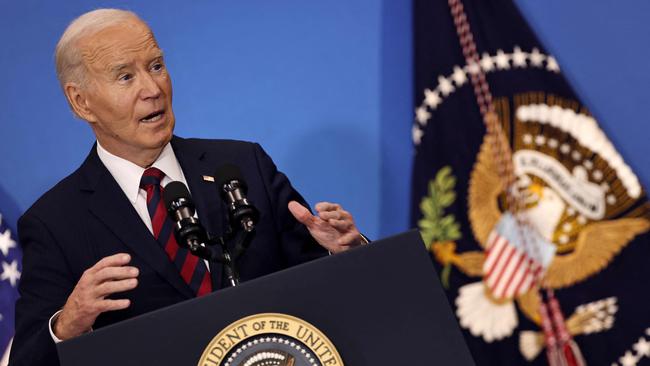 Joe Biden delivers remarks on his economic accomplishments at the Brookings Institution.