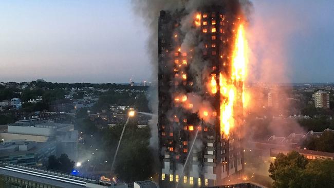 (FILES) This file handout photo received from local resident Natalie Oxford early on June 14, 2017 shows flames and smoke coming from a 27-storey block of flats after a fire broke out in west London. - Grenfell survivors and families of the 72 victims will come together and remember their loved ones two years after the tower block fire.  June 14, 2019 marks 24 months since a small kitchen fire in a west London high-rise turned into the most deadly domestic blaze since the Second World War. (Photo by Natalie OXFORD / Natalie Oxford / AFP) / -----EDITORS NOTE --- RESTRICTED TO EDITORIAL USE - MANDATORY CREDIT "AFP PHOTO / Natalie Oxford" - NO MARKETING - NO ADVERTISING CAMPAIGNS - DISTRIBUTED AS A SERVICE TO CLIENTS - NO ARCHIVES