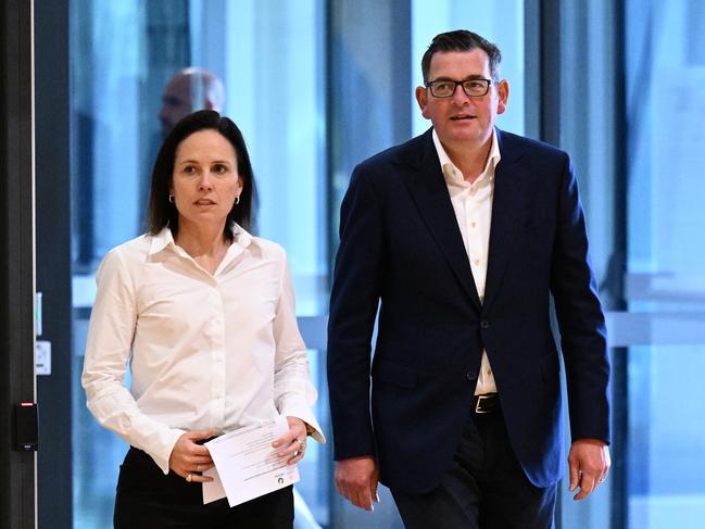 (L-R) Netball Australia CEO Kelly Ryan and Victorian Premier Daniel Andrews arrive to a press conference in Melbourne, Monday, October 31, 2022. Visit Victoria will sponsor Netball Australia for the next four and a half years in a $15m deal announced today. (AAP Image/James Ross) NO ARCHIVING