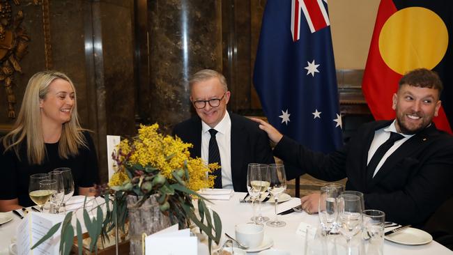 Jodie Hayton, left, Anthony Albanese and Dylan Alcott have lunch at the Australian High Commission in London on Sunday. Picture: Ella Pellegrini