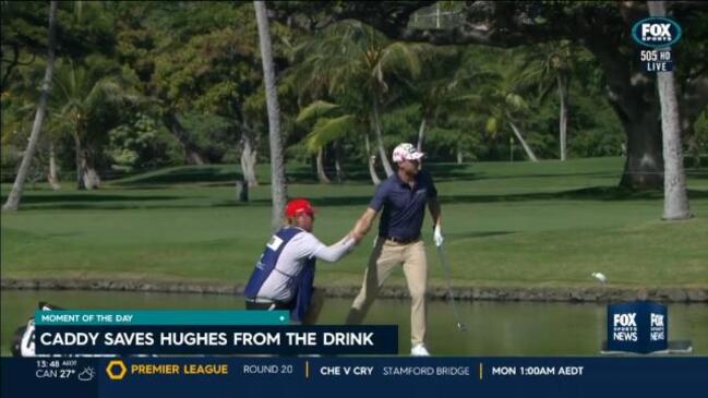Caddy on hand to save Hughes from water