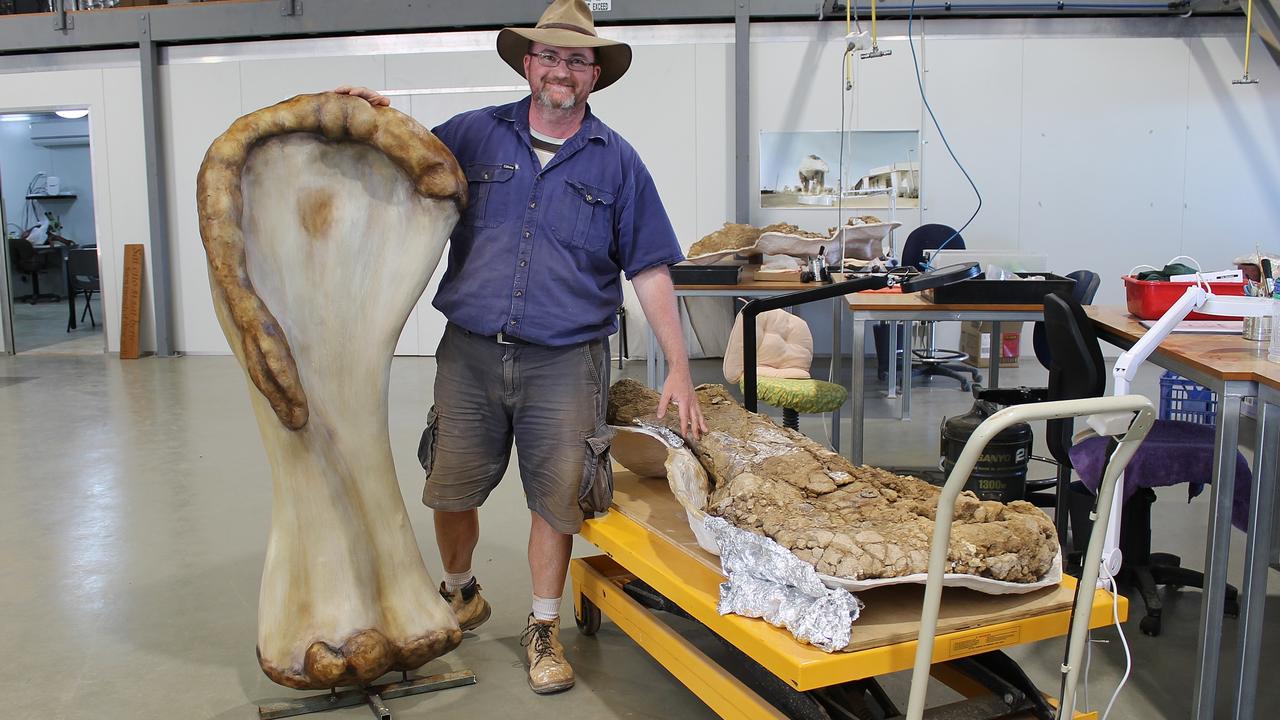 Dr Scott Hocknull with the 3D reconstruction and bone of 'Cooper's' humerus.