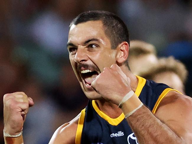 ADELAIDE, AUSTRALIA - APRIL 02: Taylor Walker of the Crows celebrates a goal during the 2021 AFL Round 03 match between the Adelaide Crows and the Gold Coast Suns at Adelaide Oval on April 02, 2021 in Adelaide, Australia. (Photo by James Elsby/AFL Photos via Getty Images)