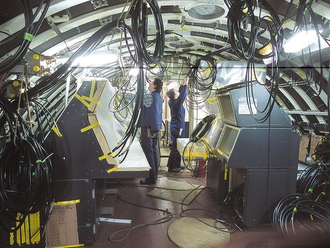 Highly skilled and experienced workforce ... TKMS workers fitting out one of six new submarines now being built at the TKMS shipyard in Kiel. Supplied: German Suubmarine