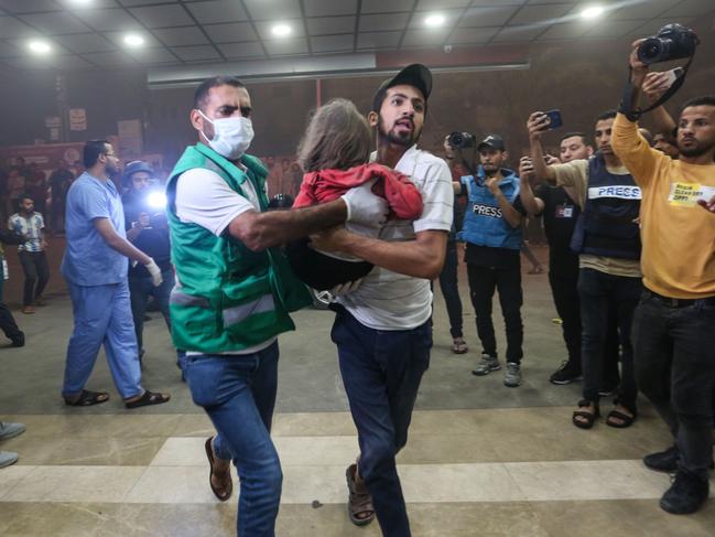 Palestinians injured in Israeli air raids arrive at Nasser Medical Hospital in Khan Yunis, in the southern Gaza Strip, Gaza. Picture: Getty Images