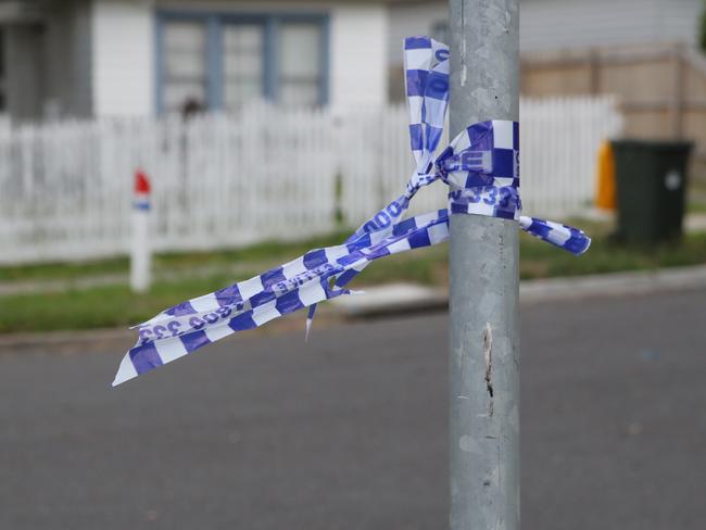 Police tape in Olive Grove in Frankston where a body was discovered last night. Picture: David Crosling