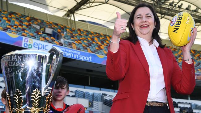 Queensland Premier Annastacia Palaszczuk living it up on Wednesday at the announcement that the AFL grand final will be in Brisbane. Picture: Dan Peled