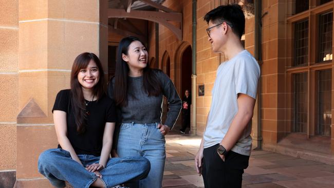 Malaysian student Leesa Zulkefli, left, with fellow Sydney University students Alina Lin and Natsaran Ang. Picture: Jane Dempster