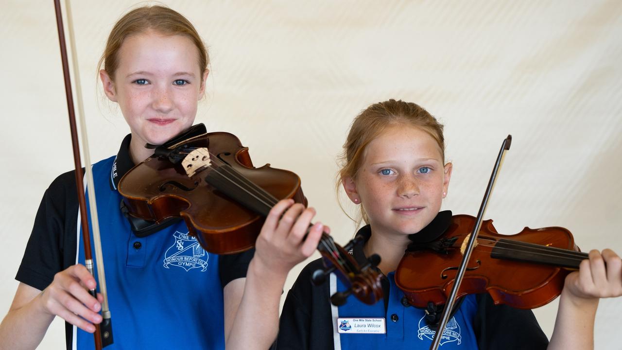 Maya McBride and Laura Wilcox from One Mile State School prepare for the small instrumental ensemble strings (primary school) at the Gympie Eisteddfod. August 1, 2023. Picture: Christine Schindler