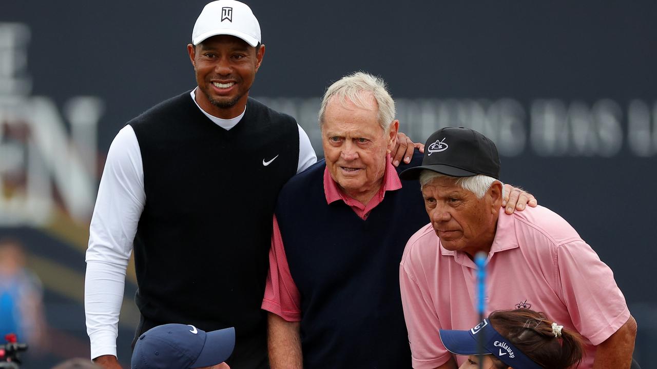 Tiger Woods and Lee Trevino pose for a photo with Jack Nicklaus. Photo by Kevin C. Cox/Getty Images.