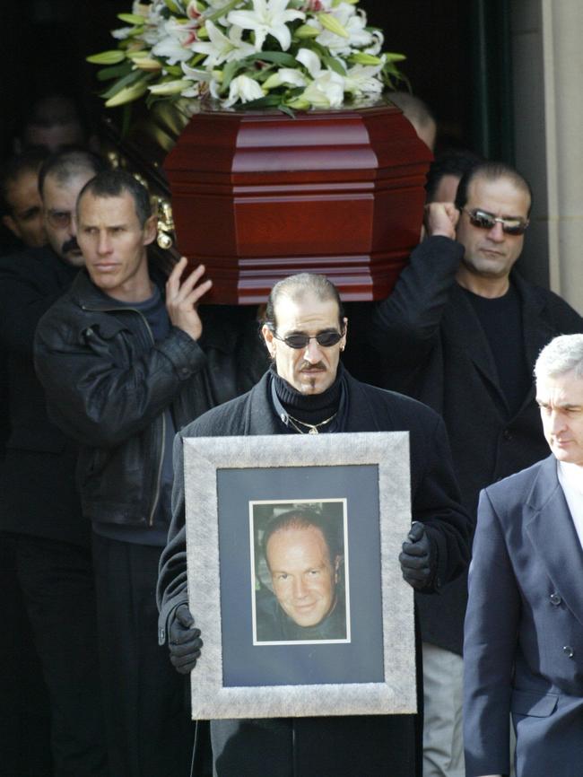 Thompson’s body is carried from St. Monicas Catholic Church in Moonee Ponds.