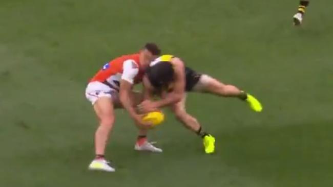 Trent Cotchin's high bump on Dylan Shiel.