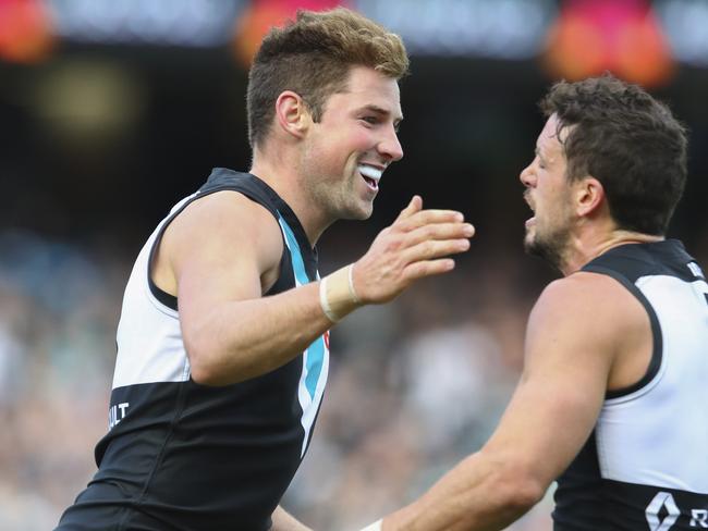 Brett Eddy celebrates A goal with Travis Boak. Picture Sarah Reed