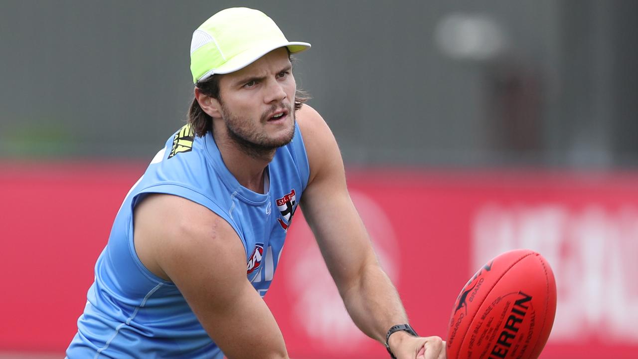 Hunter Clark returned to St Kilda training on Monday wearing a non-contact cap after his facial fracture and concussion a fortnight ago. Picture: David Crosling