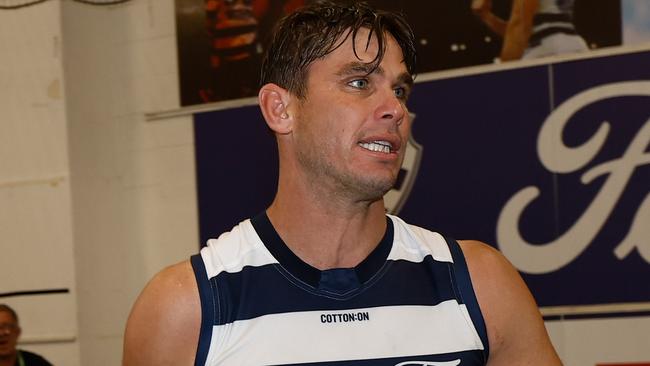 MELBOURNE, AUSTRALIA - APRIL 01: Tom Hawkins of the Cats is seen with son Henry after his 350th. Match during the 2024 AFL Round 03 match between the Hawthorn Hawks and the Geelong Cats at the Melbourne Cricket Ground on April 01, 2024 in Melbourne, Australia. (Photo by Michael Willson/AFL Photos via Getty Images)