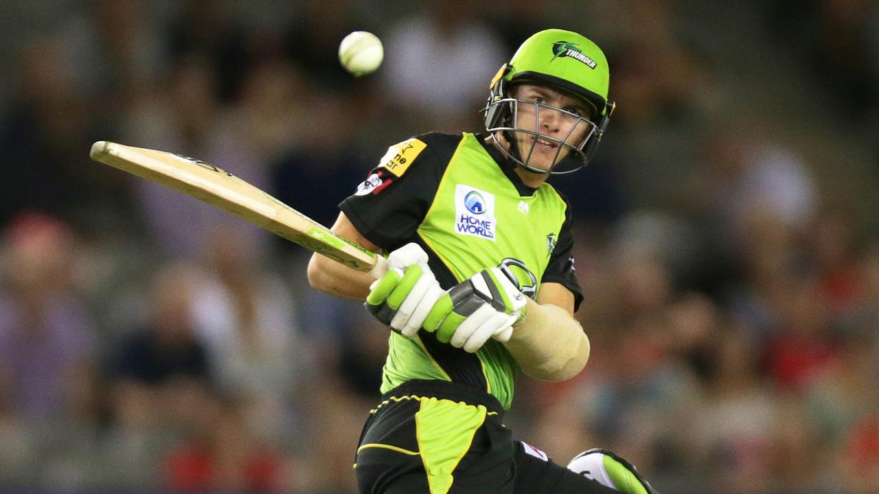 Sam Harper of the Melbourne Renegades looks on as Baxter Holt of the Sydney Thunder plays reverse sweep during the Big Bash League (BBL) match between the Melbourne Renegades and the Sydney Thunder at Marvel Stadium in Melbourne, Wednesday, January 30, 2019. (AAP Image/George Salpigtidis) NO ARCHIVING, EDITORIAL USE ONLY, IMAGES TO BE USED FOR NEWS REPORTING PURPOSES ONLY, NO COMMERCIAL USE WHATSOEVER, NO USE IN BOOKS WITHOUT PRIOR WRITTEN CONSENT FROM AAP