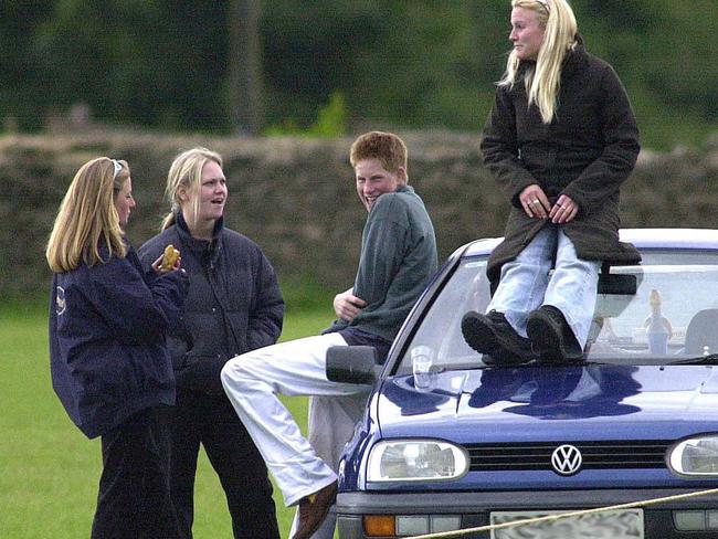 Prince Harry with three female friends in 2001, the year in which lawyers argue the Duke’s medical confidentiality was breached. Picture: Getty Images