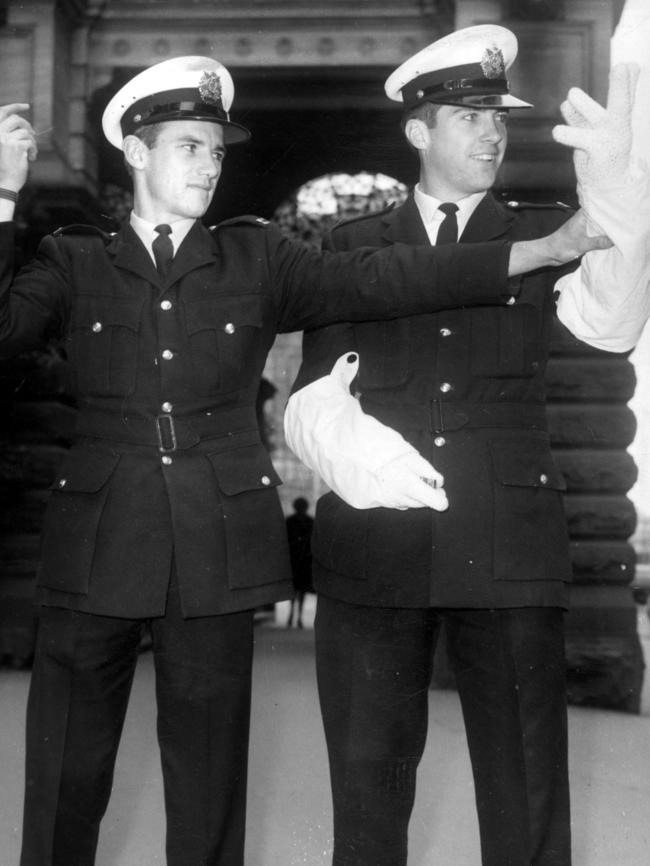 Rex Hunt (right) directing traffic with Stuart Trott in St Kilda in 1968.