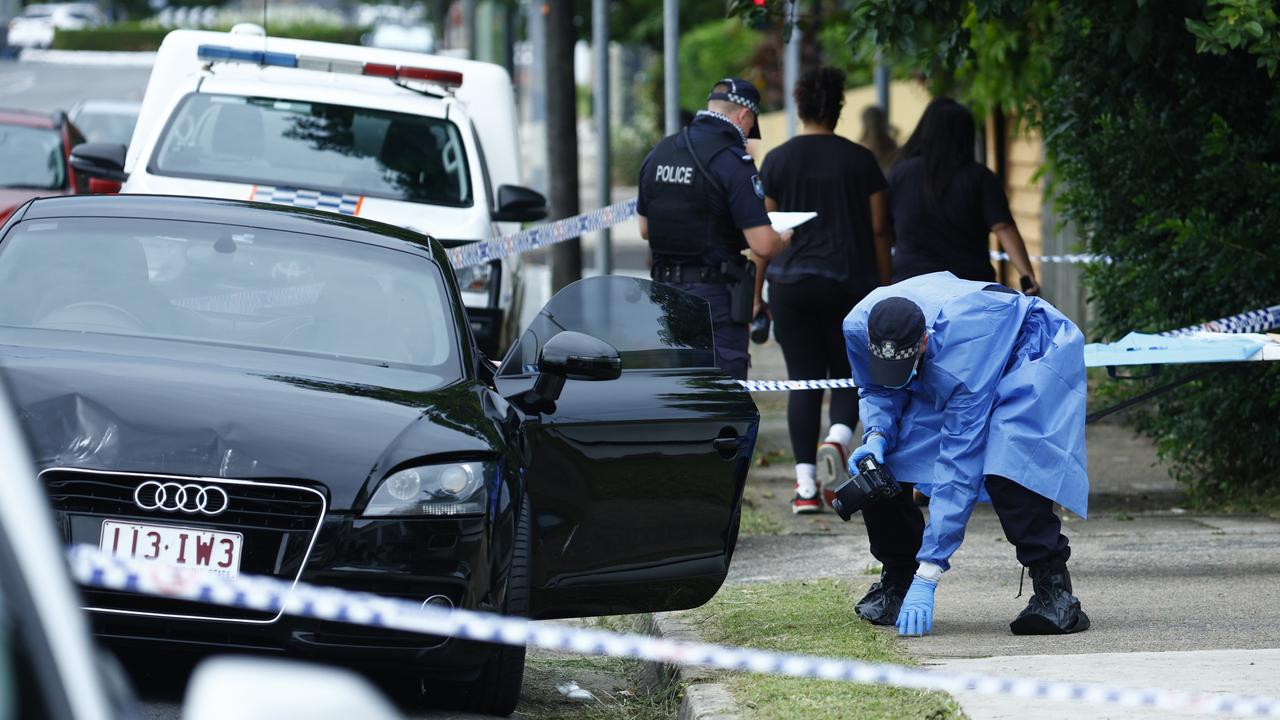 The suburb of Edge Hill went into lockdown on Thursday March 28, after reports that a man had been shot on Collins Ave. Police forensic officers inspect a black Audi TT coupe related to the shooting, found abandoned on Pease Street. Picture: Brendan Radke