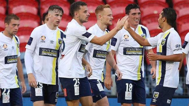 Mariners players celebrate a goal against the Jets. Picture: Getty Images