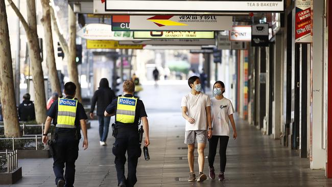 Police patrol in central Melbourne as the city faces an extension of stage four restrictions. Picture: Getty Images