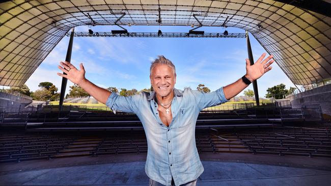 Jon Stevens posing up at the Myer Music Bowl ahead of a series of socially-distant concerts at the venue. Picture: Nicki Connolly